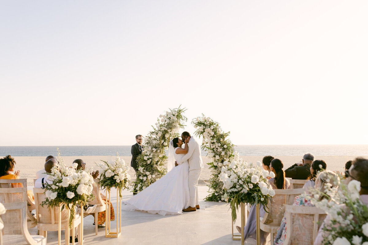 awesome all white floral wedding ceremony in the beach